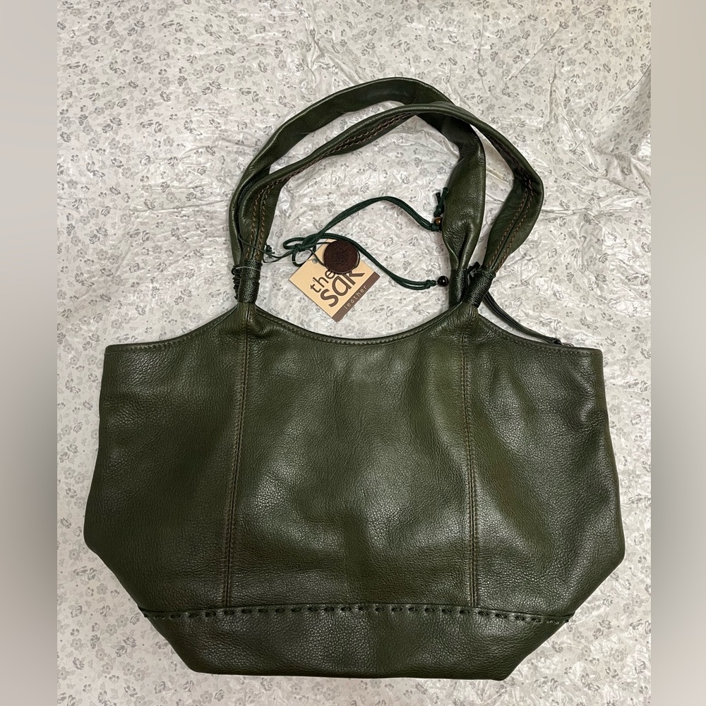 Olive green leather shoulder bag by The Sak